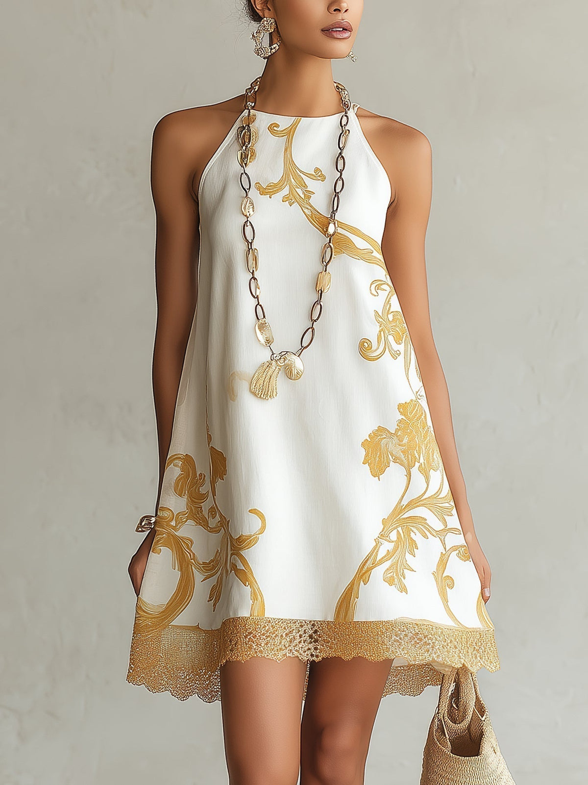 Dori - Vestido mini de encaje blanco con motivos dorados