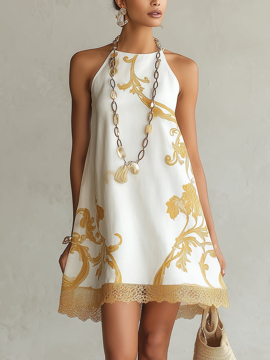 Dori - Vestido mini de encaje blanco con motivos dorados