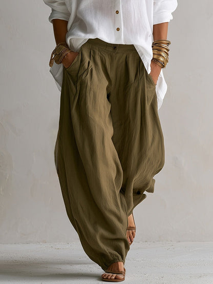 Carmen - Camisa blanca amplia y pantalón globo verde oliva